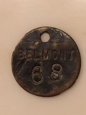 Шахта "Бельмонт". В 1911 году на этой шахте произошёл пожар, в результате которого погибло 17 шахтёров. Бирка примерно 1905 года