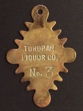Редкая бирка для ключей ликёро-водочной компании Tonopah 1906 года. Здание всё ещё стоит на месте
