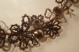 Один из волосяных венков - образцов викторианского «изящного
ремесла», хранящихся в Музее пионеров Колорадо-Спрингс