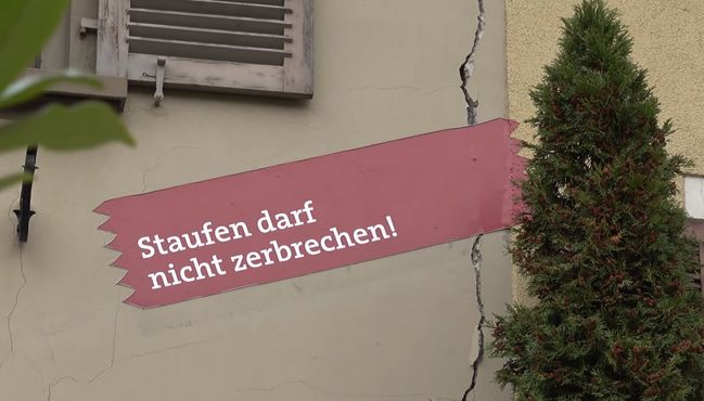 Надпись на ленте гласит: "Штауфен не должен развалиться"