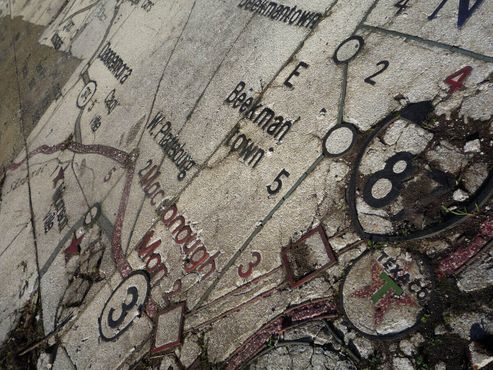 Фрагмент карты Texaco на мозаичном полу в павильоне штата Нью-Йорк
