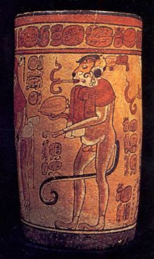Изображение курящей табак коаты на древней вазе майя