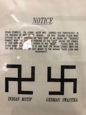 На табличке объясняется разница между индийским узором и нацистской свастикой